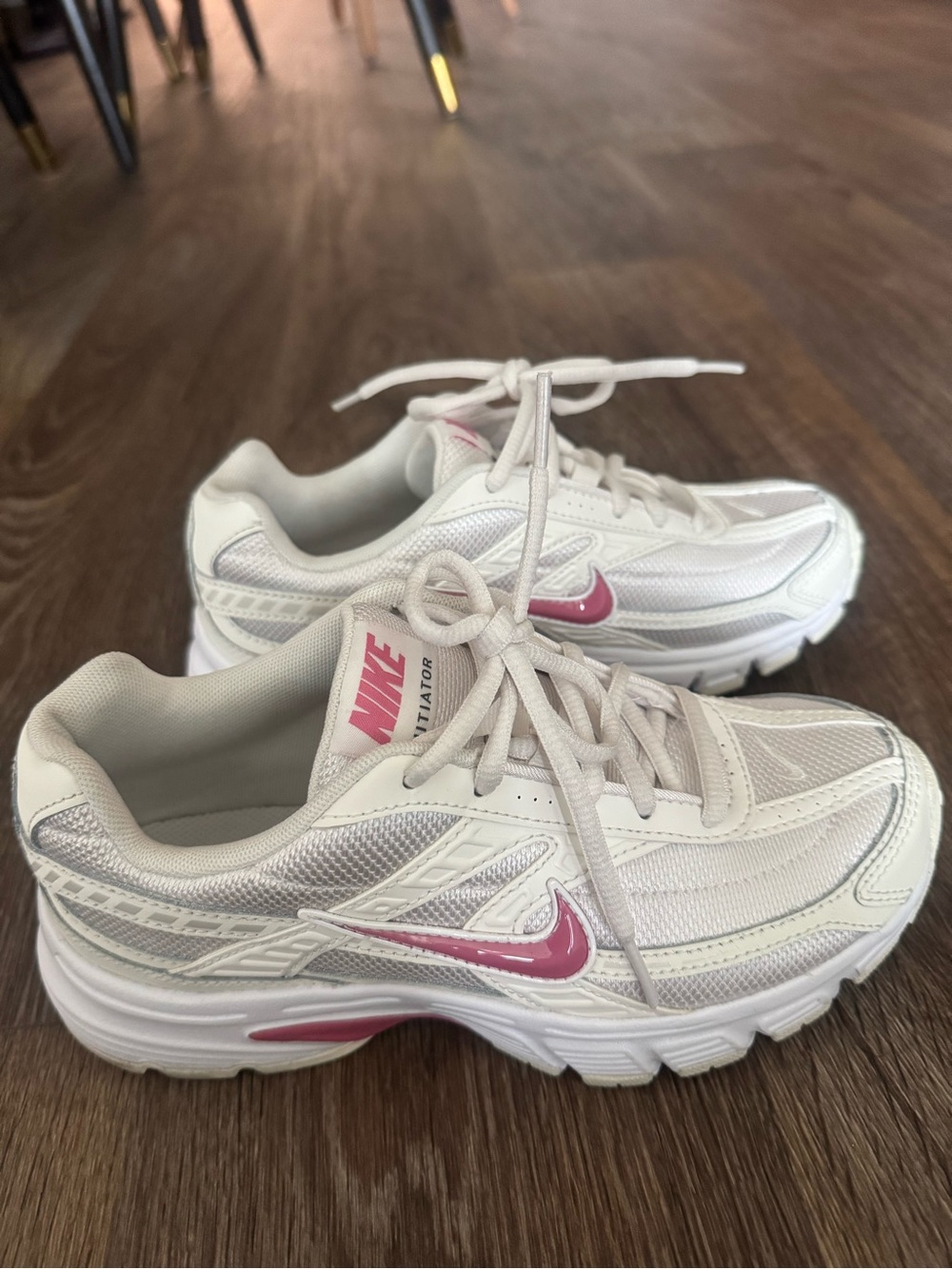 Nike Women’s White Sneakers with Pink Swoosh